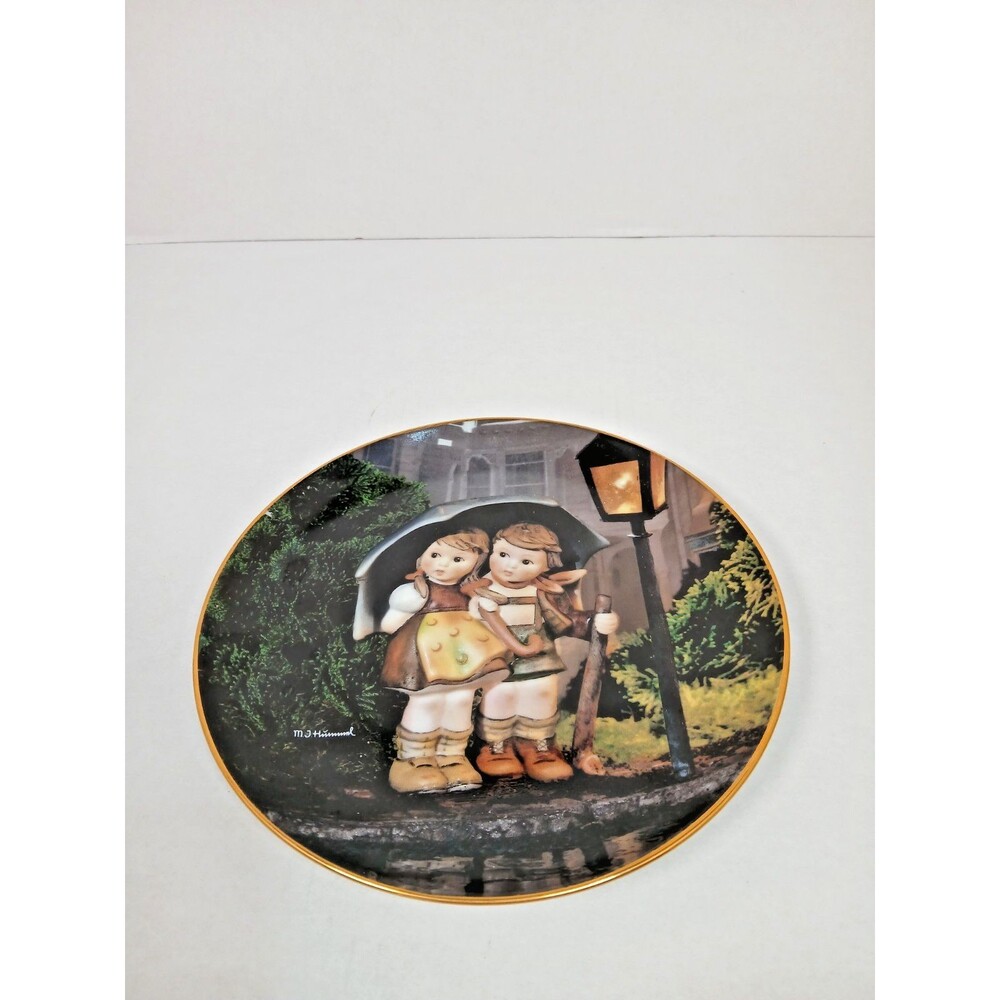 M.J. Hummel "Stormy Weather" Collector Plate With Gold Rim. 8 inches.